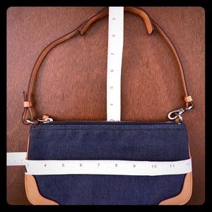 COACH denim-leather wristlet